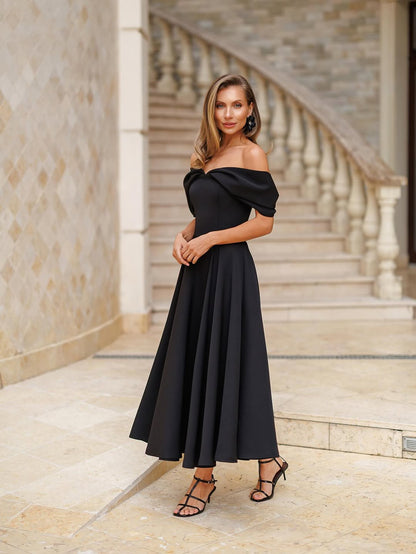 Deliha — Fließendes Off-Shoulder Kleid
