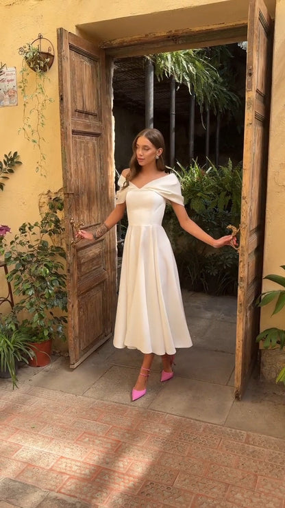 Deliha — Fließendes Off-Shoulder Kleid