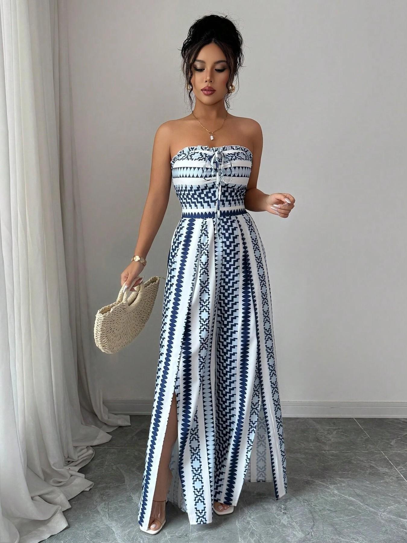Vaelisse — Halter-Neck Jumpsuit mit geometrischem Druck und seitlichem Schlitz