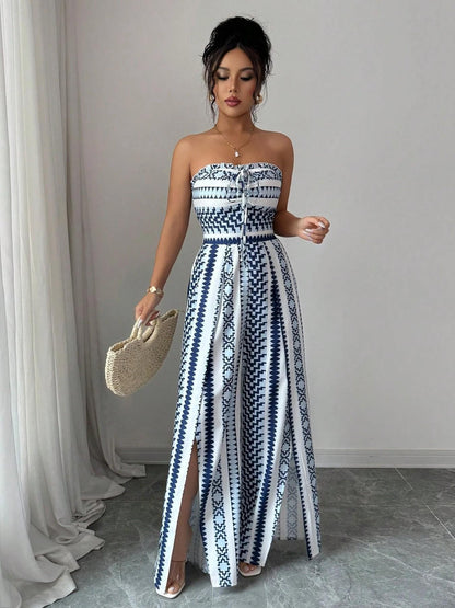 Vaelisse — Halter-Neck Jumpsuit mit geometrischem Druck und seitlichem Schlitz